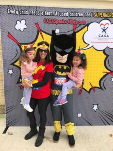 Melinda and Brian with daughters at CASA Superhero Run